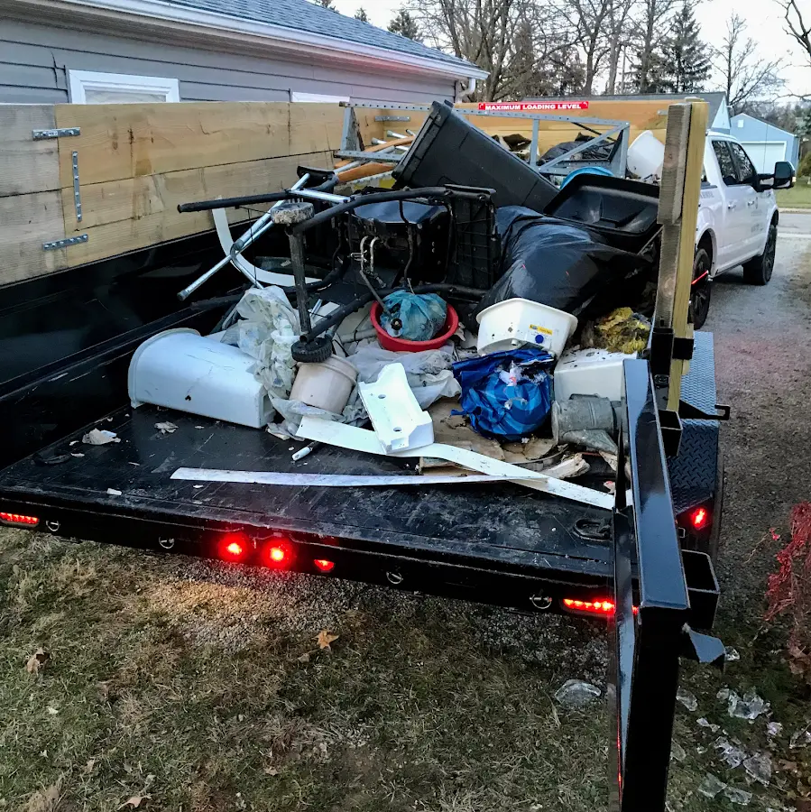 Roll-off dumpster delivered to a residential driveway in Carmel